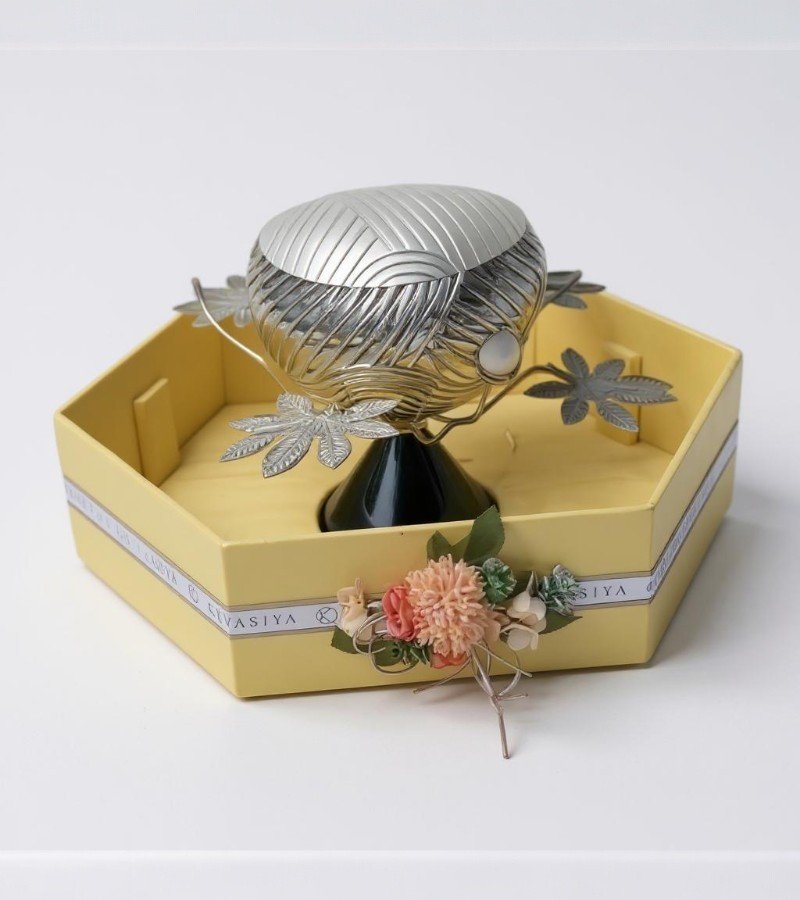 Silver Bowl Set on a Rich Green Base image 1